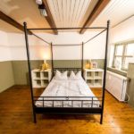 Ferienwohnung Altes Forsthaus - Ein grünes Schlafzimmer